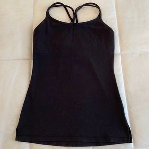 Black Ivivva tank top with built in bra and nice crossover back for girls.